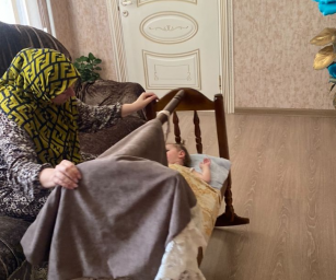 ​В Алхастах обратились к народной традиции укладывания малыша в люльку – ага